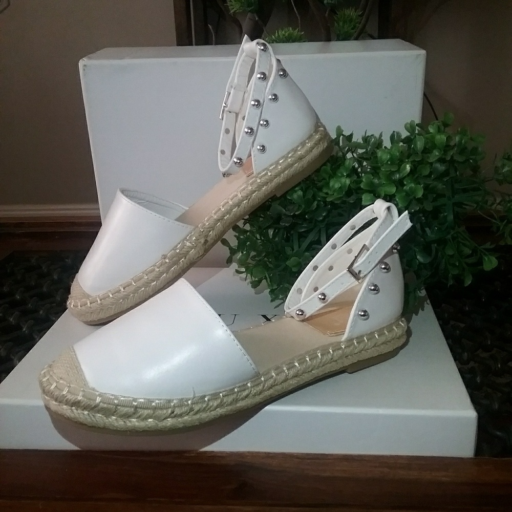 New C'M Paris Ankle Strap espadrilles.
